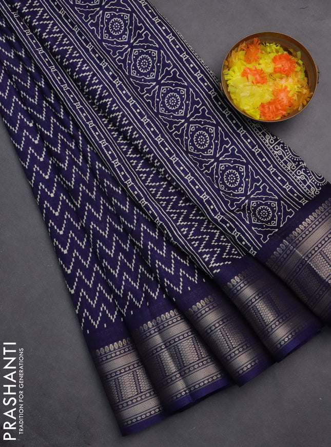 Semi dola saree navy blue with allover zig zag prints and zari woven border