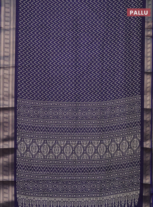 Semi dola saree navy blue with allover zig zag prints and zari woven border