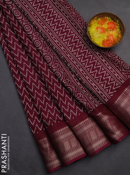 Semi dola saree wine shade with allover zig zag prints and zari woven border