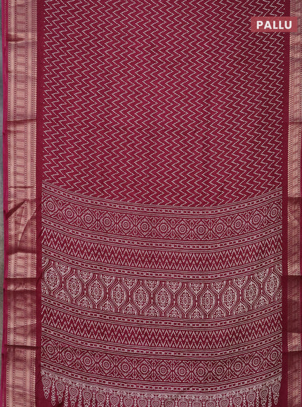 Semi dola saree wine shade with allover zig zag prints and zari woven border