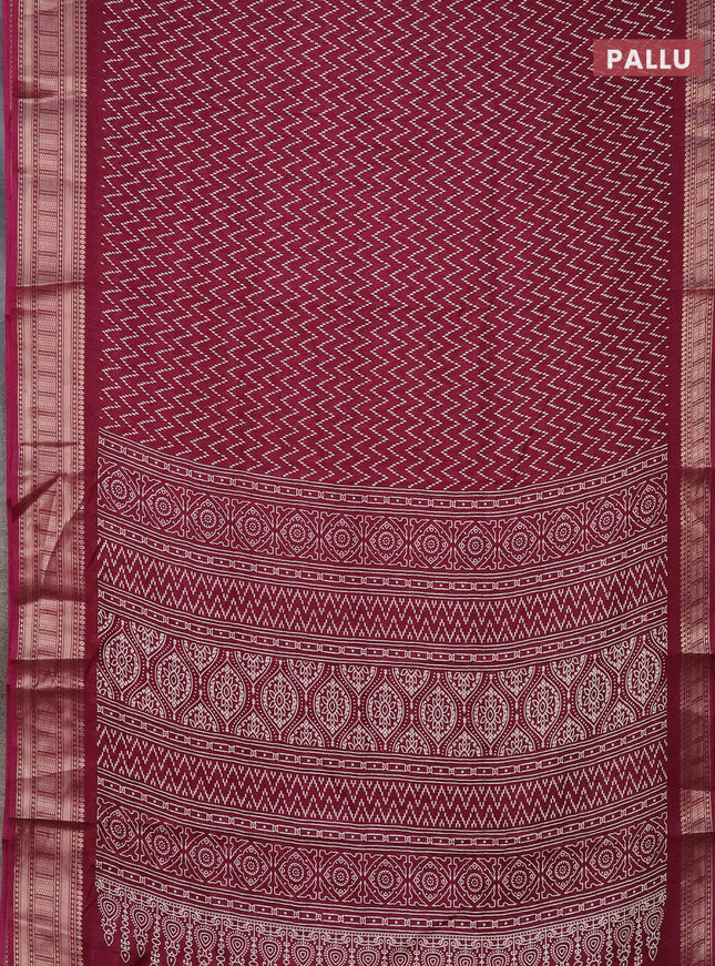 Semi dola saree wine shade with allover zig zag prints and zari woven border