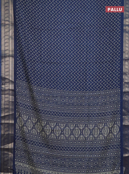 Semi dola saree peacock blue with allover zig zag prints and zari woven border