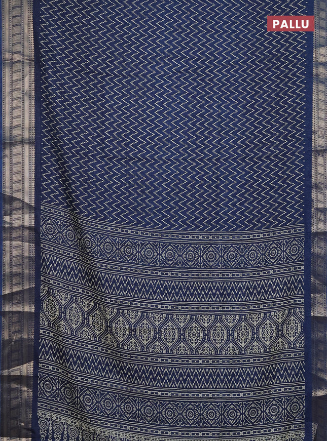 Semi dola saree peacock blue with allover zig zag prints and zari woven border
