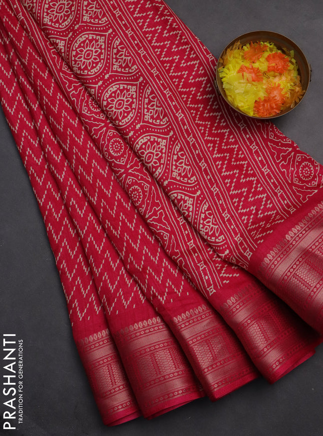 Semi dola saree pink with allover zig zag prints and zari woven border