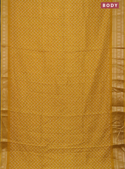 Semi dola saree yellow with allover zig zag prints and zari woven border