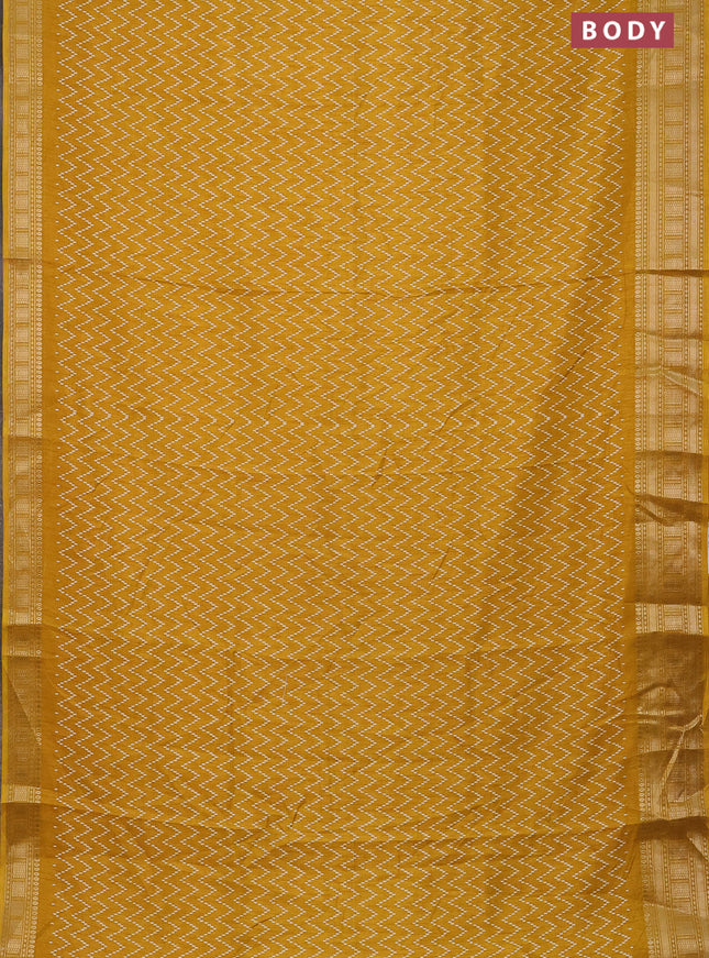 Semi dola saree yellow with allover zig zag prints and zari woven border