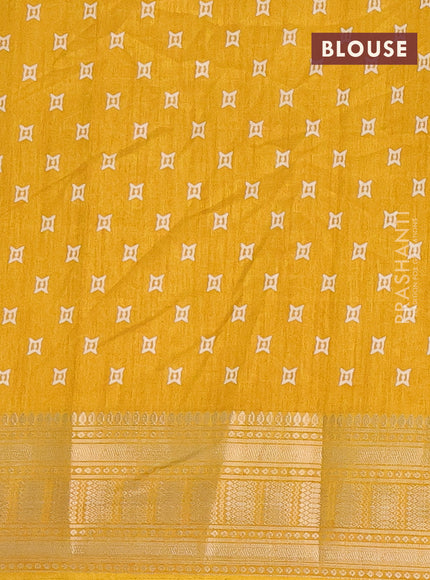 Semi dola saree yellow with allover zig zag prints and zari woven border