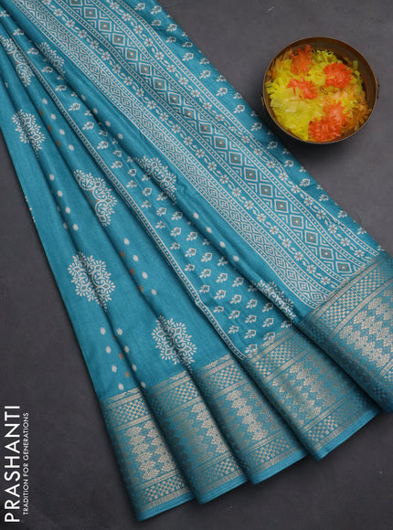 Semi dola saree teal blue with butta prints and zari woven border
