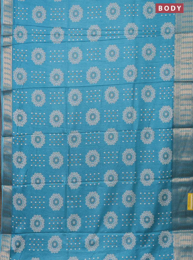 Semi dola saree teal blue with butta prints and zari woven border
