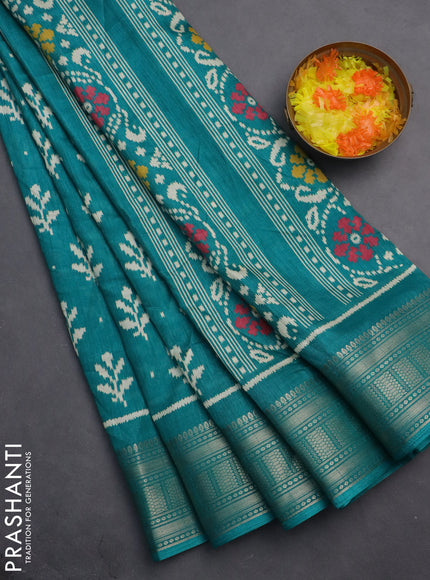 Semi dola saree teal green with allover ikat butta prints and zari woven border