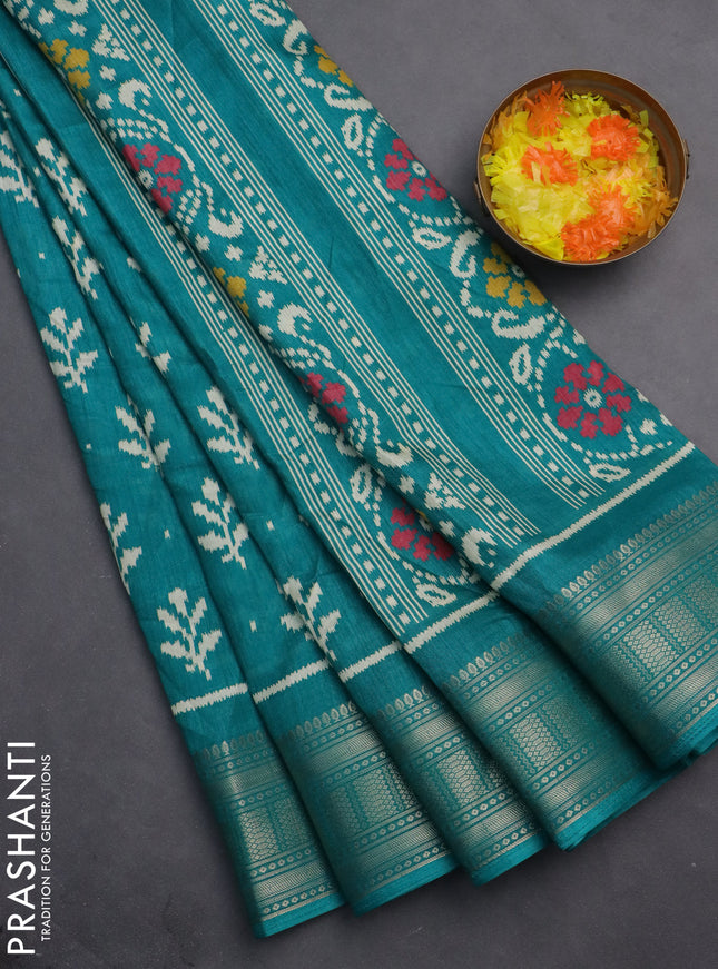 Semi dola saree teal green with allover ikat butta prints and zari woven border