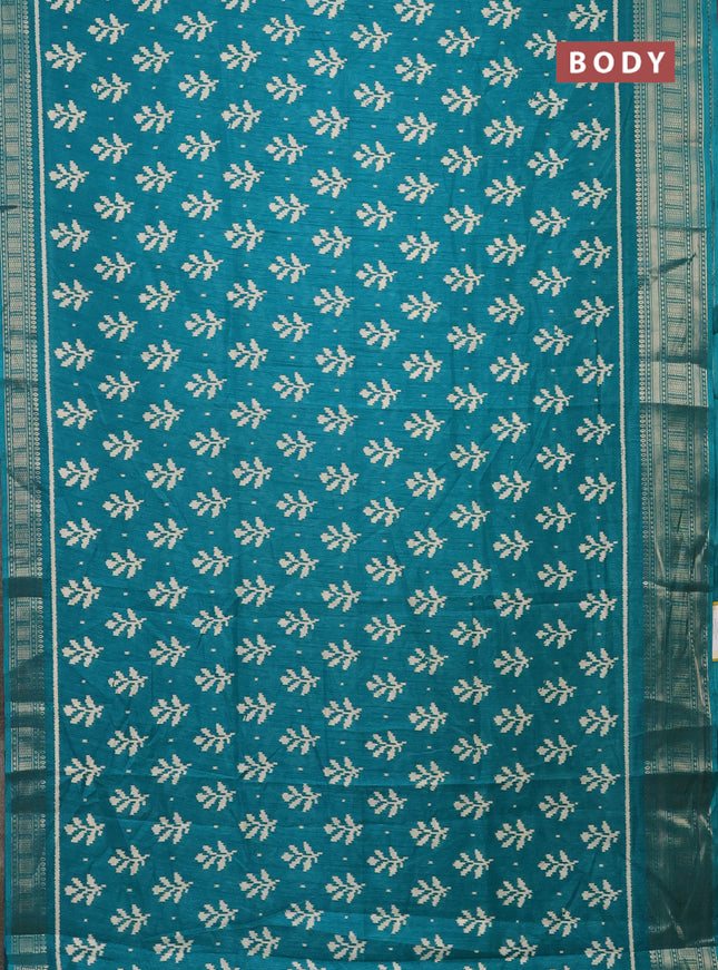Semi dola saree teal green with allover ikat butta prints and zari woven border