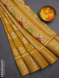 Semi dola saree mustard yellow with allover ikat butta prints and zari woven border