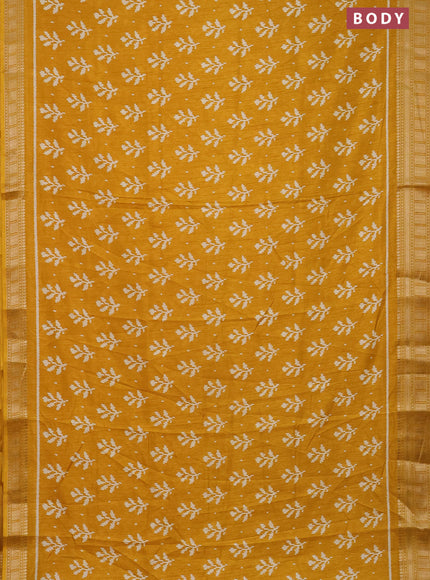 Semi dola saree mustard yellow with allover ikat butta prints and zari woven border
