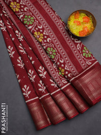 Semi dola saree maroon with allover ikat butta prints and zari woven border