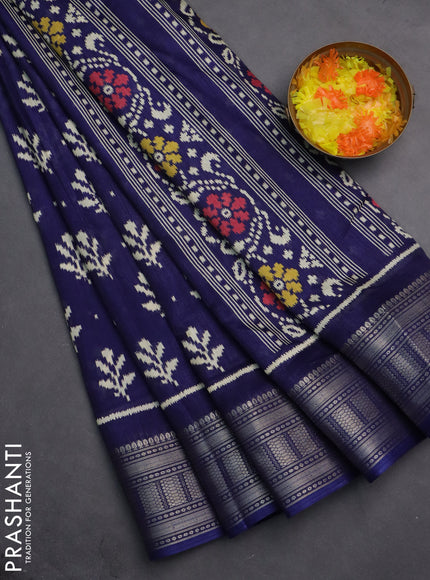 Semi dola saree blue with allover ikat butta prints and zari woven border