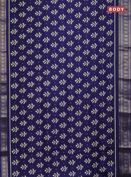 Semi dola saree blue with allover ikat butta prints and zari woven border