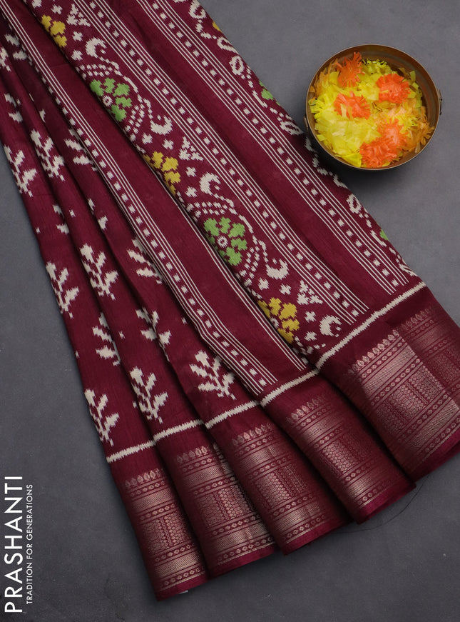 Semi dola saree wine shade with allover ikat butta prints and zari woven border