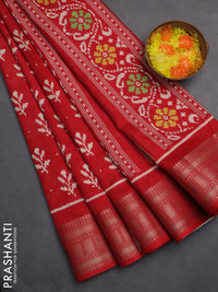 Semi dola saree red with allover ikat butta prints and zari woven border