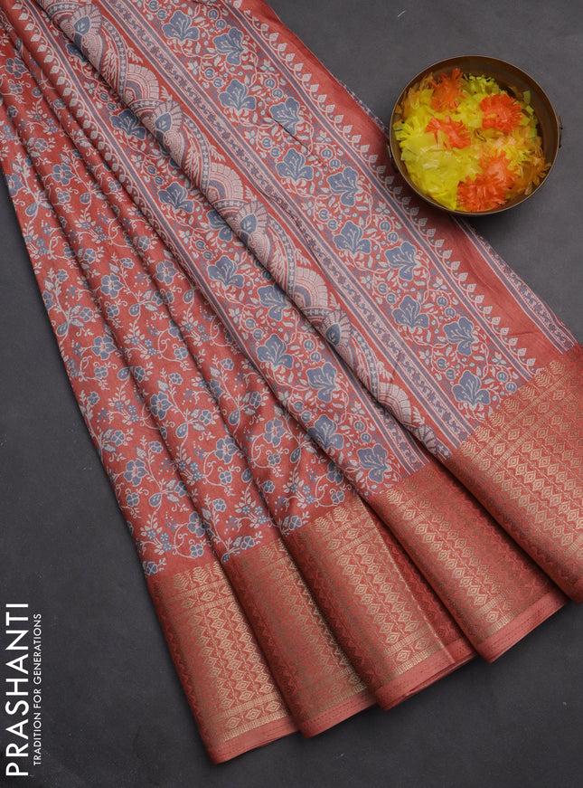 Semi dola saree peach shade with allover prints and zari woven border