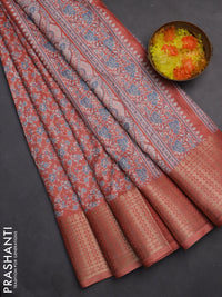 Semi dola saree peach shade with allover prints and zari woven border