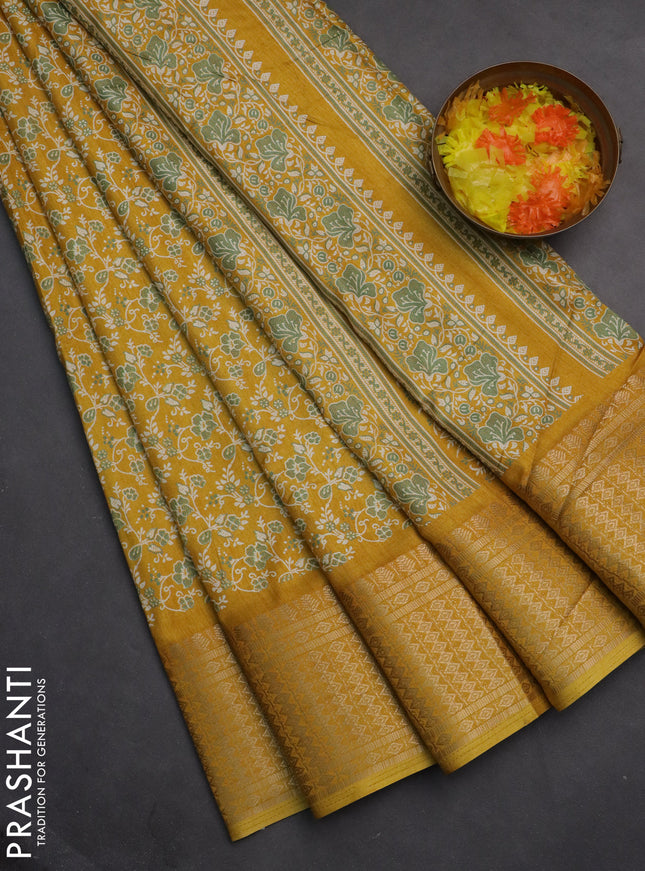 Semi dola saree mustard yellow with allover prints and zari woven border