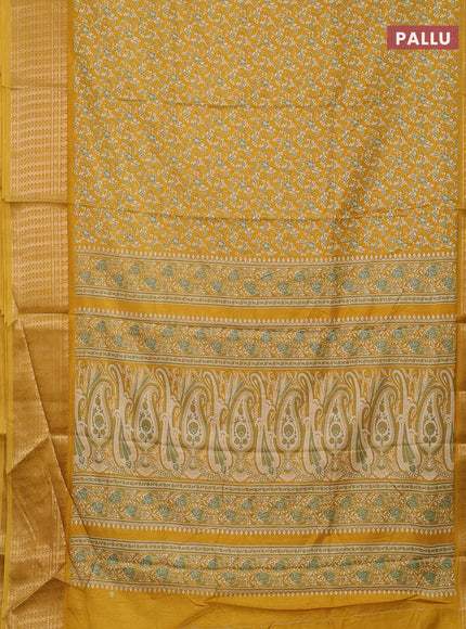 Semi dola saree mustard yellow with allover prints and zari woven border