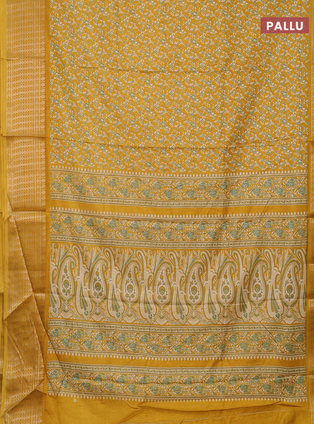 Semi dola saree mustard yellow with allover prints and zari woven border
