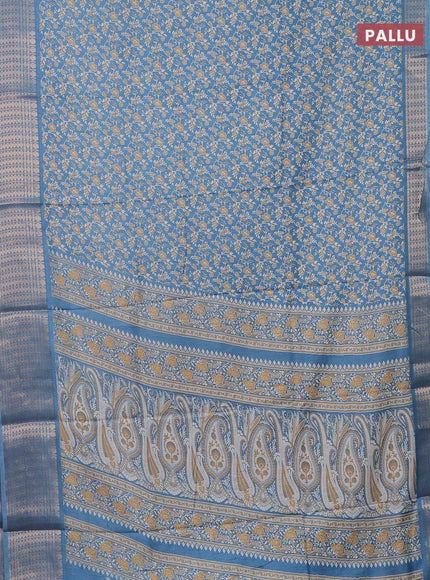 Semi dola saree cs blue with allover prints and zari woven border