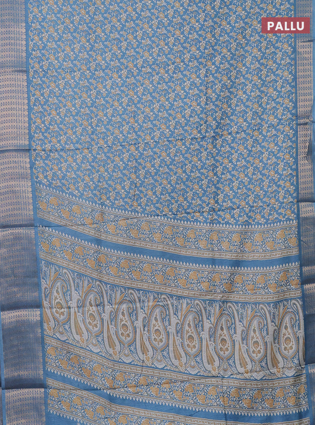 Semi dola saree cs blue with allover prints and zari woven border