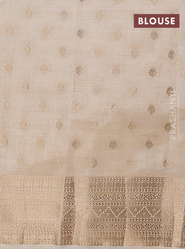 Semi raw silk saree cream with allover zari woven 1000 buttas and zari woven border