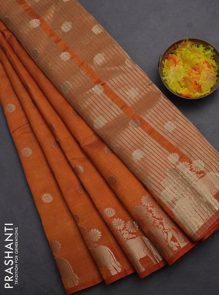 Semi raw silk saree orange with allover zari woven 1000 buttas and elephant design zari butta border