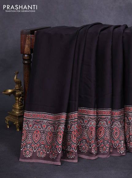 Modal silk saree black and brown with plain body and ajrakh printed border & pallu