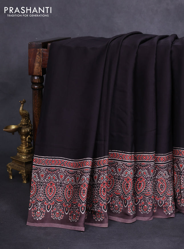 Modal silk saree black and brown with plain body and ajrakh printed border & pallu