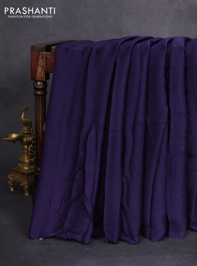 Modal silk saree blue and maroon with plain body and ajrakh printed pallu & blouse