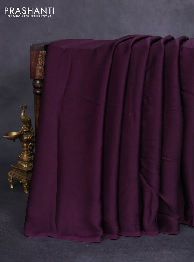 Modal silk saree wine shade and peacock blue with plain body and ajrakh printed pallu & blouse