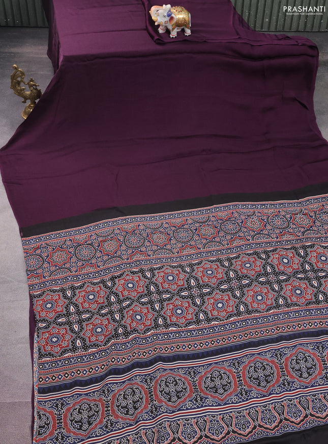 Modal silk saree wine shade and peacock blue with plain body and ajrakh printed pallu & blouse