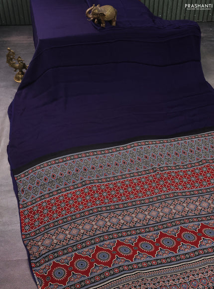 Modal silk saree dark blue and black with plain body and ajrakh printed pallu & blouse