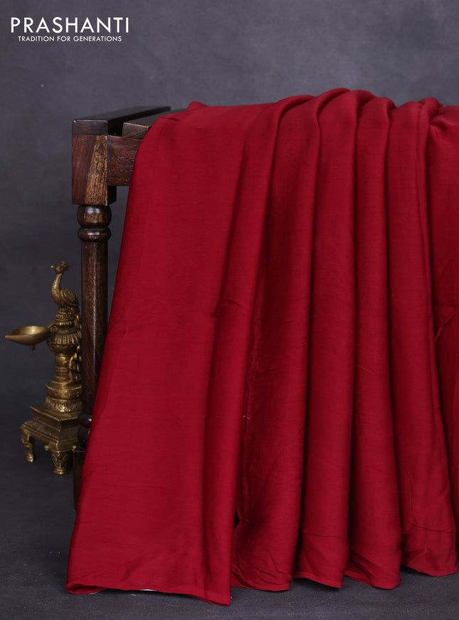 Modal silk saree maroon and black with plain body and ajrakh printed pallu & blouse