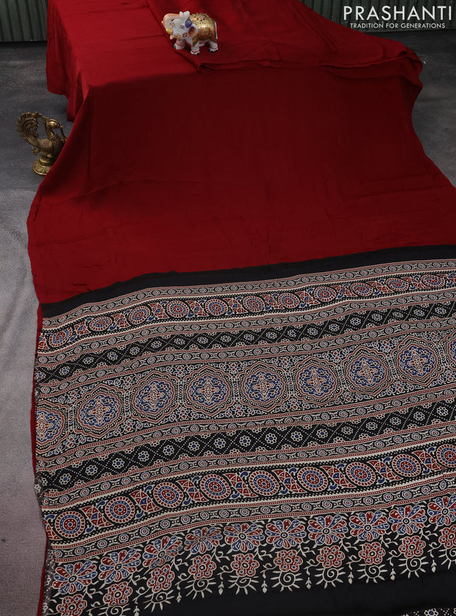 Modal silk saree maroon and black with plain body and ajrakh printed pallu & blouse