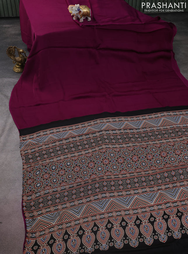 Modal silk saree purple and black with plain body and ajrakh printed pallu & blouse