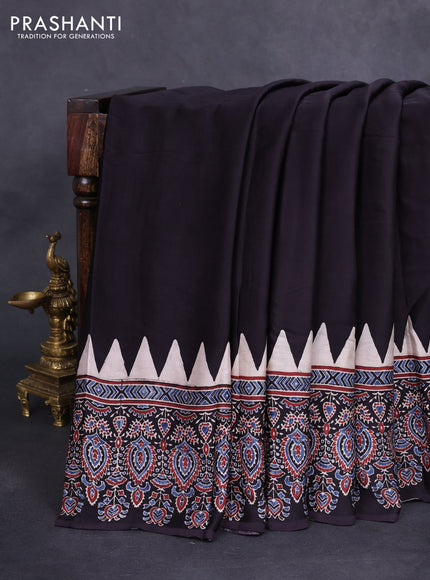 Modal silk saree black with plain body and ajrakh printed border & pallu