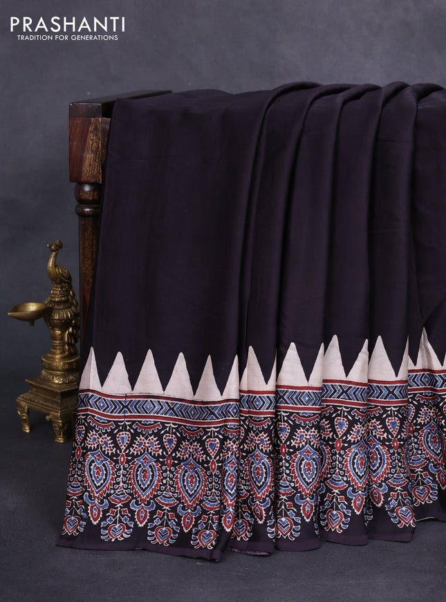 Modal silk saree black with plain body and ajrakh printed border & pallu