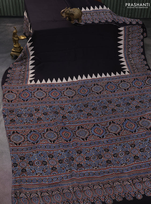 Modal silk saree black with plain body and ajrakh printed border & pallu
