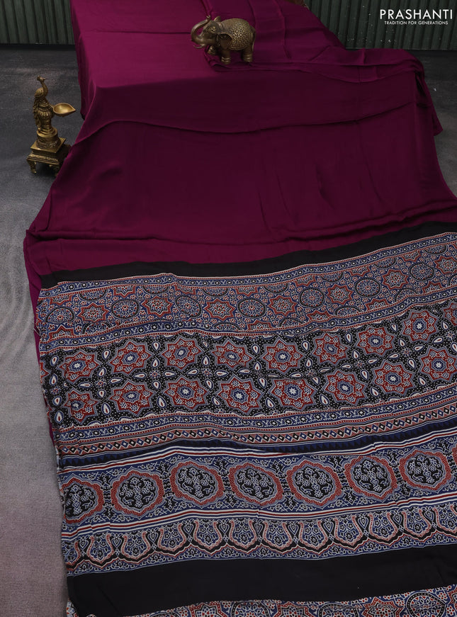 Modal silk saree purple and black with plain body and ajrakh printed pallu & blouse