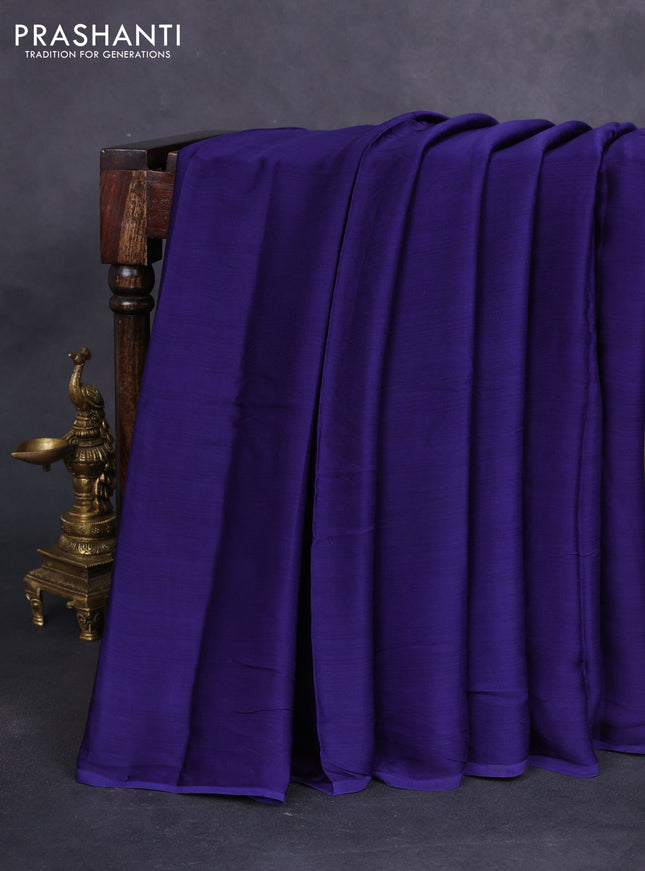 Modal silk saree blue and black with plain body and ajrakh printed pallu & blouse