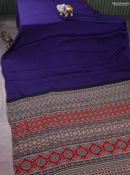 Modal silk saree blue and black with plain body and ajrakh printed pallu & blouse