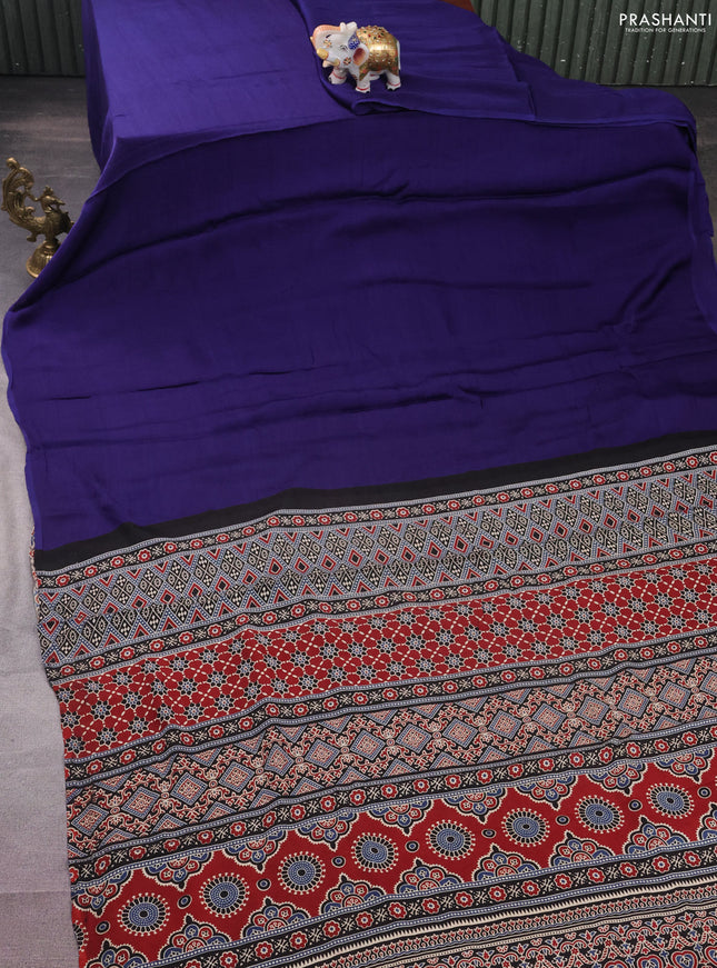 Modal silk saree blue and black with plain body and ajrakh printed pallu & blouse