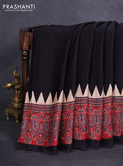 Modal silk saree black and maroon with plain body and ajrakh printed border & pallu