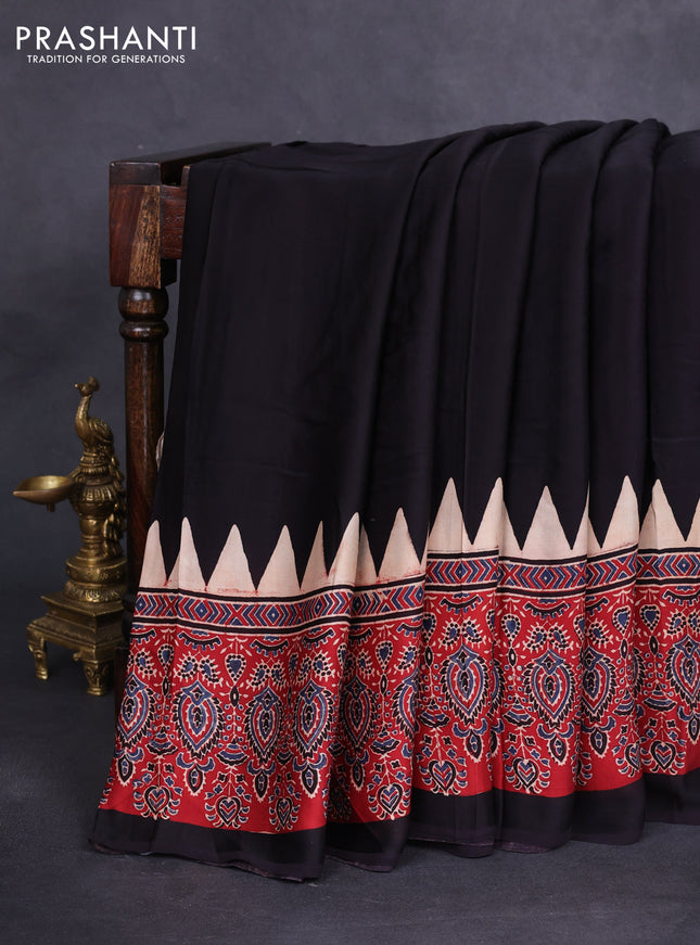 Modal silk saree black and maroon with plain body and ajrakh printed border & pallu